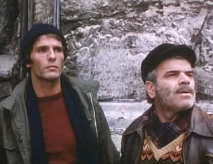 Един мъж на колене